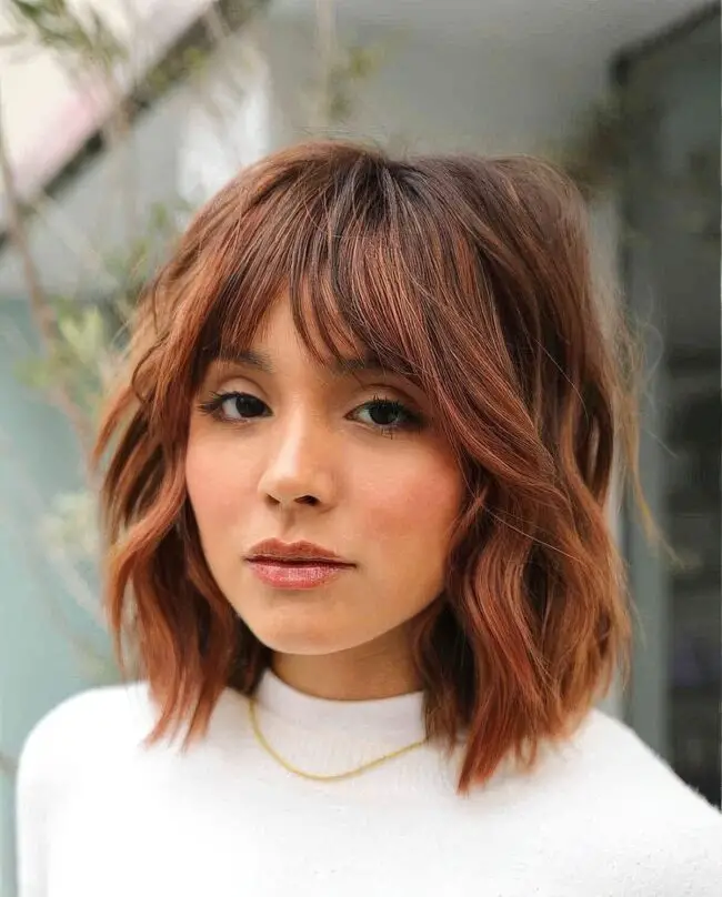 Tousled Auburn Waves with Youthful Bangs