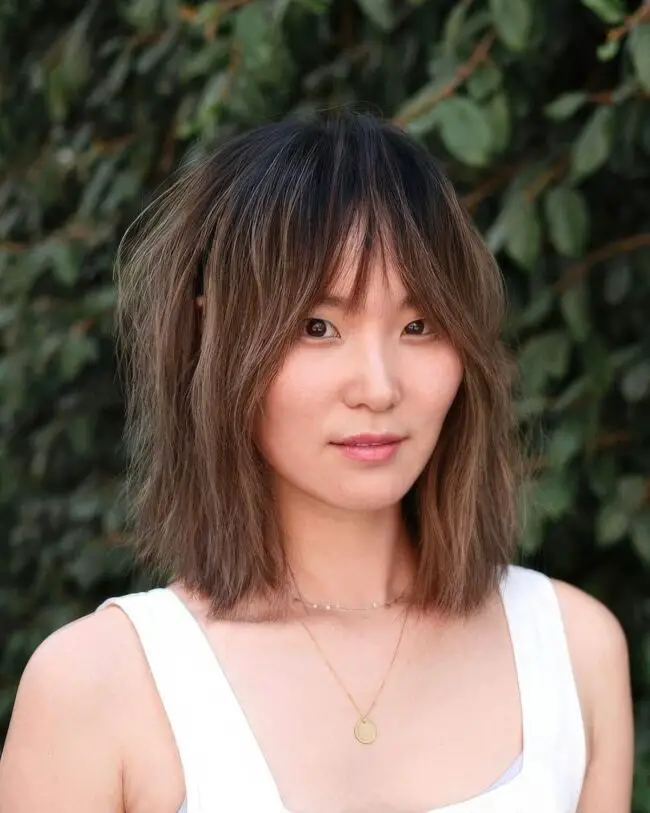 Chic Sun-Kissed Layered Bob Hairstyle