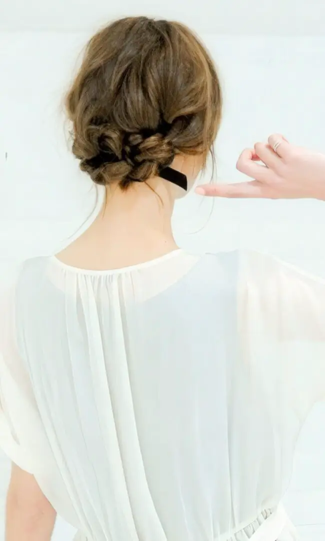 Sophisticated Twisted Bun with Subtle Highlights