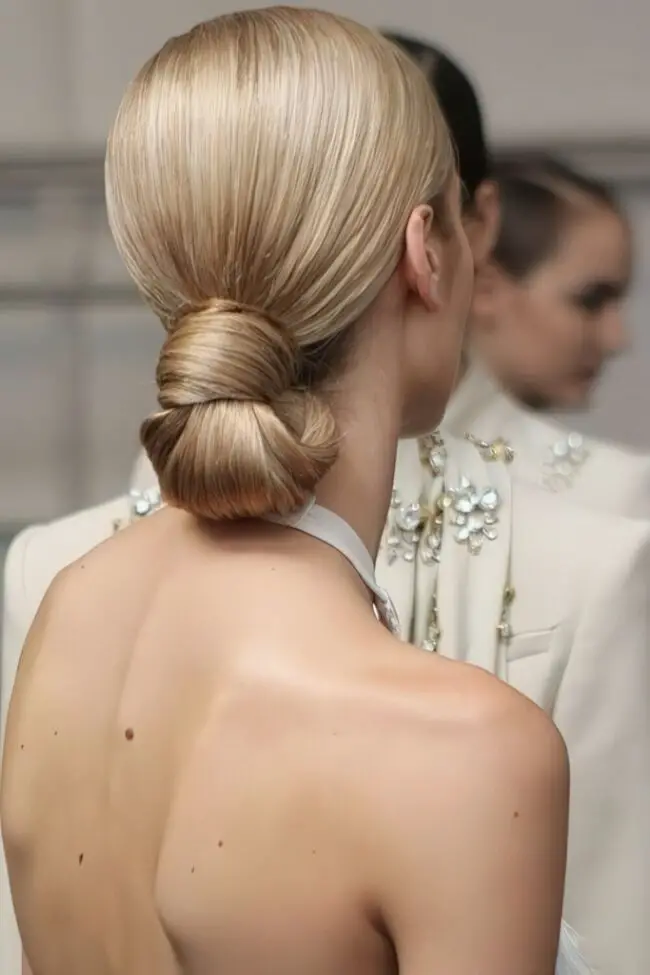 Polished Low Bun with Soft Highlights